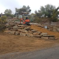 Moss rock retaining wall
